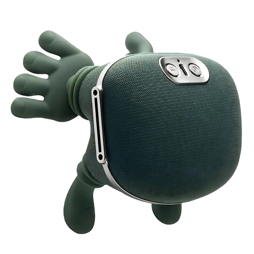 Green frog-shaped Bluetooth speaker on a white background