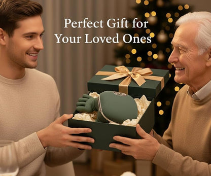 Man giving a gift to an older man with a Christmas tree in the background